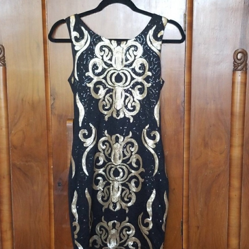 Elegant Black and Gold Mini Dress